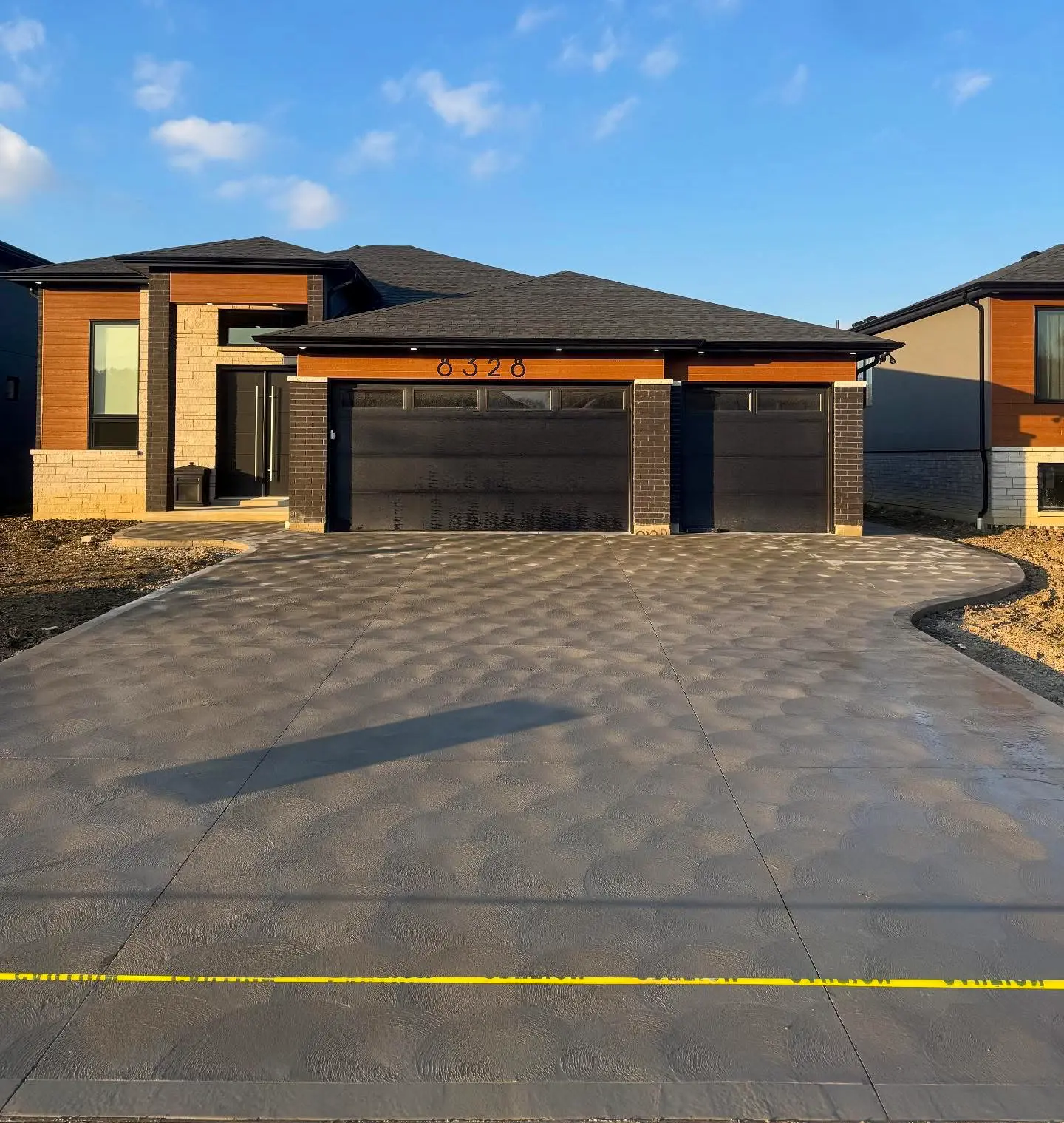 Beautiful rosette finish concrete driveway in Windsor Essex